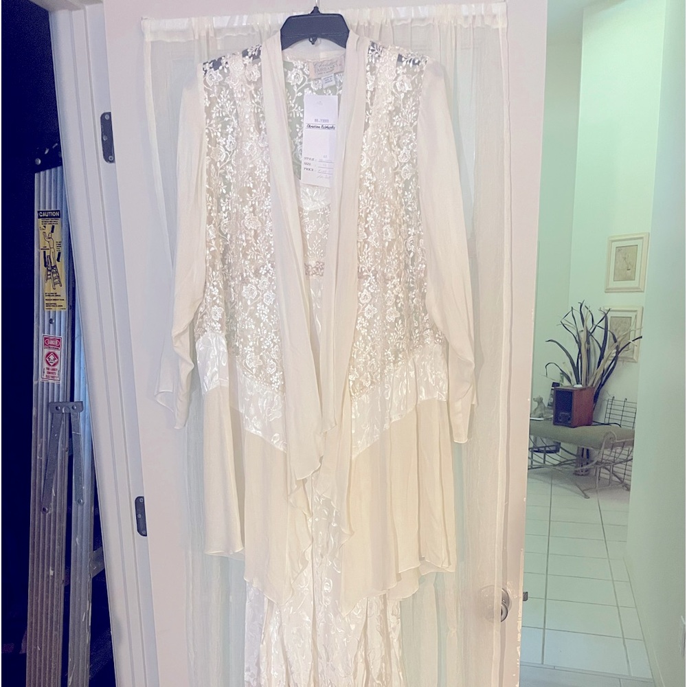 Brand new! Beautiful dress with jacket.